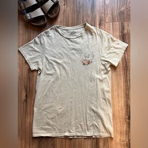 Women’s beige T-shirt with horses.